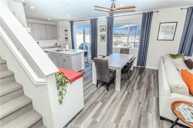 28252 Farm Creek Way, Valley Center, CA 92082 - dining area featuring light wood-style flooring, a ceiling fan, stairs, and recessed lighting