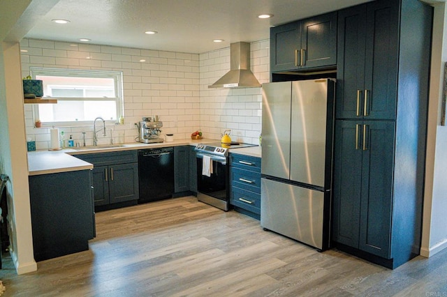 2219 Montemar, Escondido, CA 92027 - kitchen with appliances with stainless steel finishes, a sink, wall chimney range hood, decorative backsplash, and recessed lighting