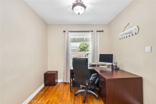 5342 Kingsley St, Montclair, CA 91763 - office area with wood finished floors and baseboards