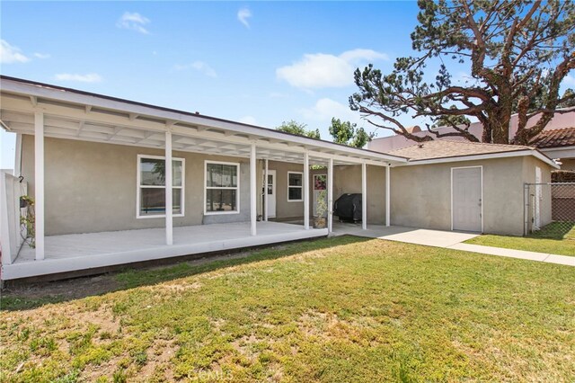 5342 Kingsley St, Montclair, CA 91763 - rear view of house with a patio and stucco siding
