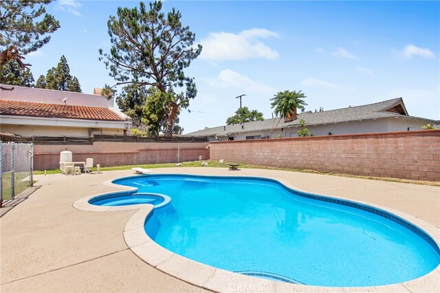 5342 Kingsley St, Montclair, CA 91763 - view of pool with a patio, a fenced backyard, and a pool with connected hot tub