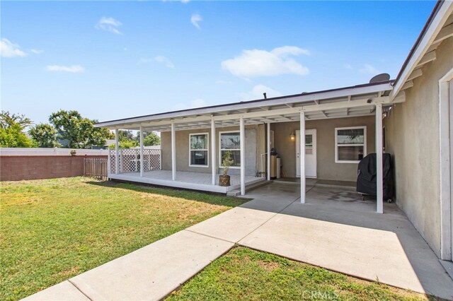 5342 Kingsley St, Montclair, CA 91763 - back of property with stucco siding and a patio
