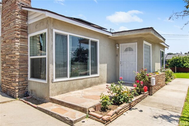 5342 Kingsley St, Montclair, CA 91763 - doorway to property with stucco siding