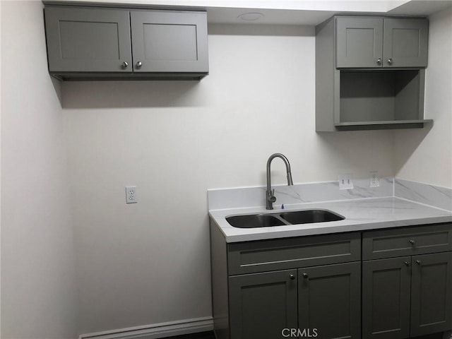 218 N Nicholson Ave, Monterey Park, CA 91755 - kitchen featuring gray cabinets and a sink