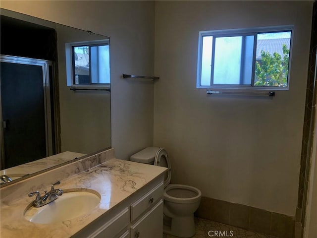 218 N Nicholson Ave, Monterey Park, CA 91755 - bathroom with a stall shower, vanity, and toilet