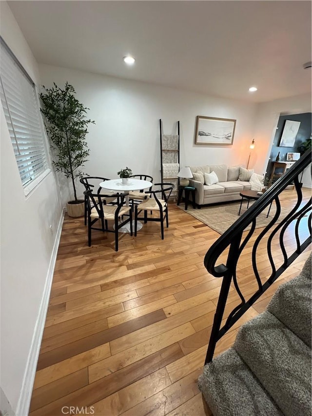 4113 E 10th St Unit 2, Long Beach, CA 90804 - dining space featuring light wood-style floors, baseboards, recessed lighting, and stairway