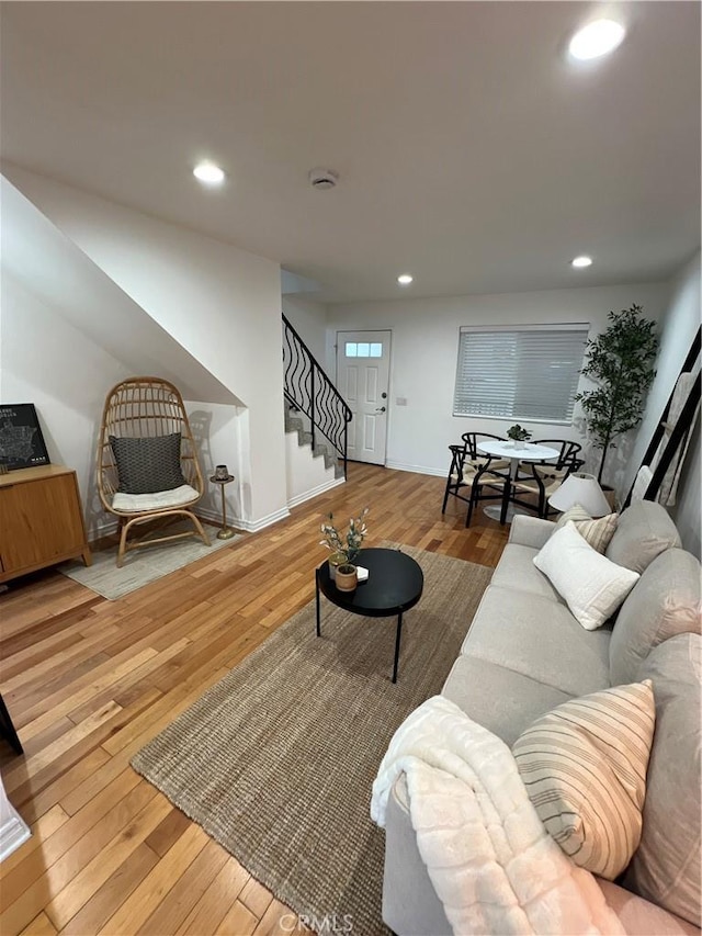 4113 E 10th St Unit 2, Long Beach, CA 90804 - living area with hardwood / wood-style flooring, stairs, recessed lighting, and baseboards