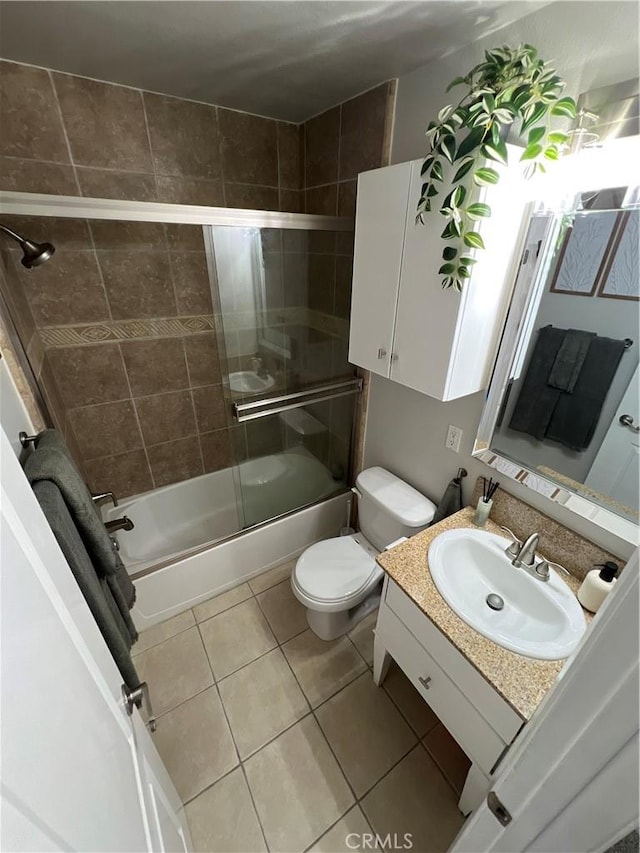 4113 E 10th St Unit 2, Long Beach, CA 90804 - bathroom with vanity, tile patterned flooring, combined bath / shower with glass door, and toilet