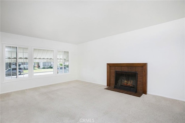 1401 N Linwood Ave, Santa Ana, CA 92701 - unfurnished living room featuring carpet flooring and a brick fireplace