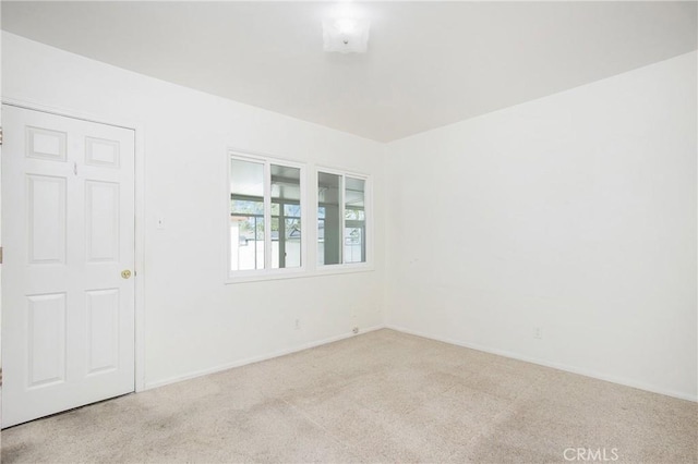 1401 N Linwood Ave, Santa Ana, CA 92701 - carpeted empty room with baseboards
