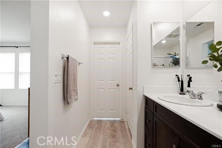 7155 Citrus Ave Unit 320, Fontana, CA 92336 - bathroom with vanity and wood finished floors