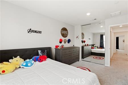 7155 Citrus Ave Unit 320, Fontana, CA 92336 - bedroom featuring carpet flooring