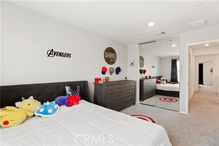 7155 Citrus Ave Unit 320, Fontana, CA 92336 - carpeted bedroom with a closet