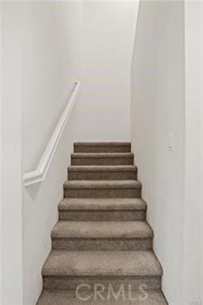 7155 Citrus Ave Unit 320, Fontana, CA 92336 - staircase featuring carpet