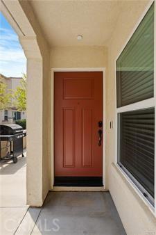 7155 Citrus Ave Unit 320, Fontana, CA 92336 - view of exterior entry featuring stucco siding