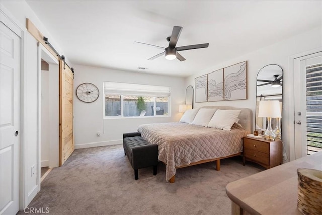 7560 Castano Ave, Atascadero, CA 93422 - carpeted bedroom with a barn door and a ceiling fan