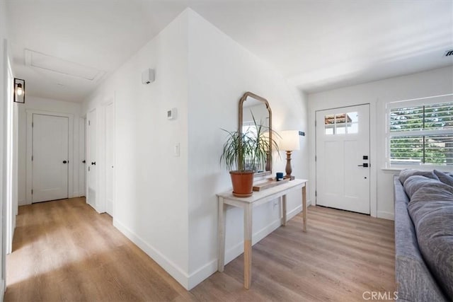7560 Castano Ave, Atascadero, CA 93422 - foyer entrance with light wood-style flooring and baseboards