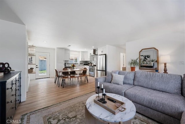 7560 Castano Ave, Atascadero, CA 93422 - living room with light wood-type flooring and recessed lighting
