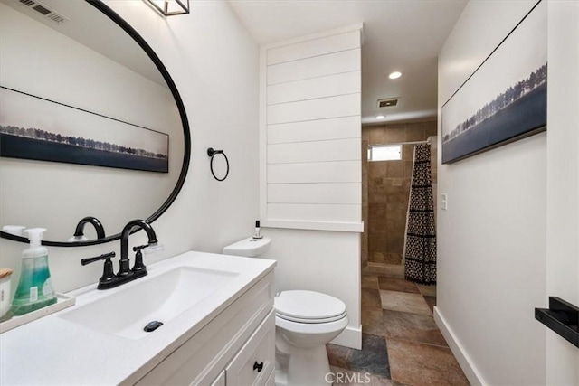 7560 Castano Ave, Atascadero, CA 93422 - full bathroom with vanity, tiled shower, recessed lighting, and stone finish flooring