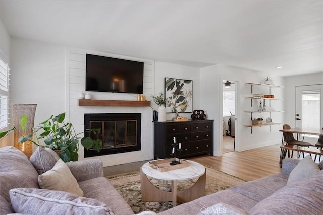 7560 Castano Ave, Atascadero, CA 93422 - living room with a large fireplace and wood finished floors