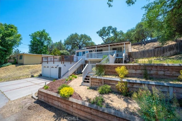 7560 Castano Ave, Atascadero, CA 93422 - back of house with stairs, driveway, and a porch