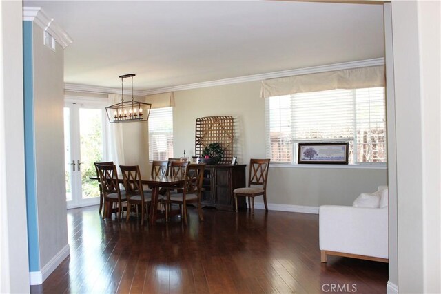 45344 Saint Tisbury St, Temecula, CA 92592 - dining room featuring wood-type flooring, baseboards, a chandelier, and ornamental molding