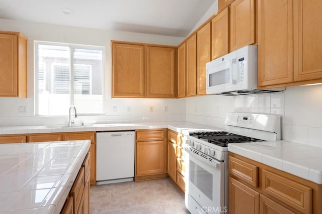 1583 Turtle Crk, Beaumont, CA 92223 - kitchen with white appliances and tile counters