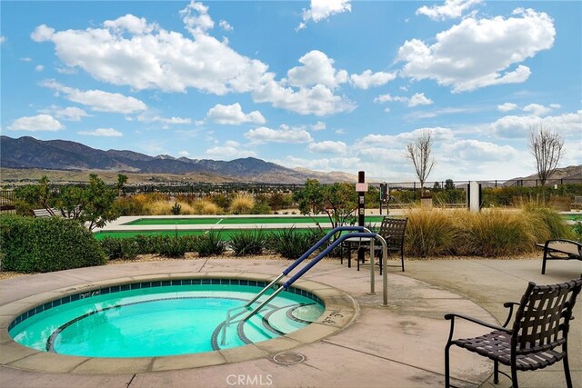 1583 Turtle Crk, Beaumont, CA 92223 - view of swimming pool featuring a community hot tub and a mountain view