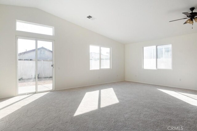 1583 Turtle Crk, Beaumont, CA 92223 - empty room with lofted ceiling, carpet, plenty of natural light, and ceiling fan