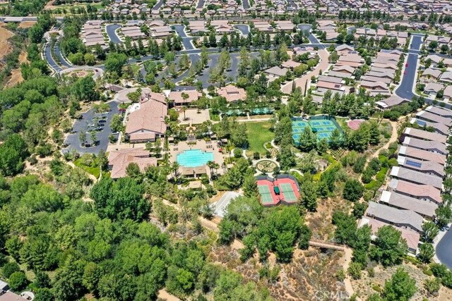1583 Turtle Crk, Beaumont, CA 92223 - aerial overview of property's location featuring a pool area and nearby suburban area