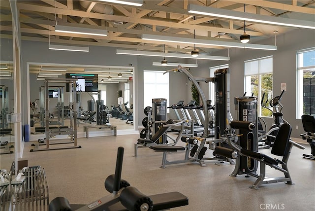 1583 Turtle Crk, Beaumont, CA 92223 - workout area featuring plenty of natural light, beamed ceiling, and high vaulted ceiling