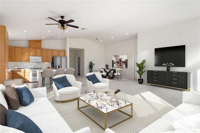 1583 Turtle Crk, Beaumont, CA 92223 - living area featuring vaulted ceiling, light colored carpet, a ceiling fan, and recessed lighting