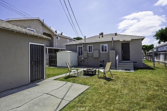 2292 Euclid Ave, Long Beach, CA 90815 - back of house with an outdoor fire pit, entry steps, stucco siding, and a patio area