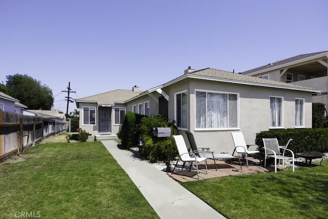 2292 Euclid Ave, Long Beach, CA 90815 - rear view of house featuring stucco siding and a chimney
