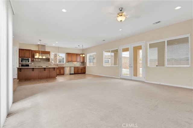 17830 Mana Rd, Apple Valley, CA 92307 - unfurnished living room with ceiling fan, baseboards, light carpet, and recessed lighting