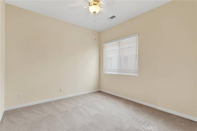 17830 Mana Rd, Apple Valley, CA 92307 - empty room featuring light colored carpet, ceiling fan, and baseboards