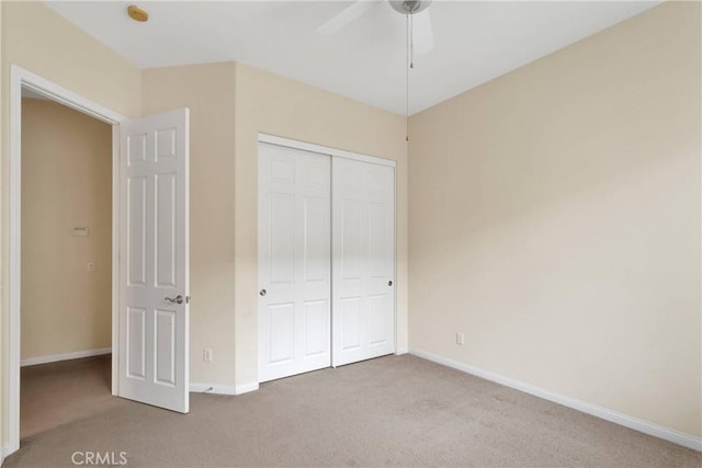 17830 Mana Rd, Apple Valley, CA 92307 - unfurnished bedroom with carpet floors, a closet, baseboards, and a ceiling fan