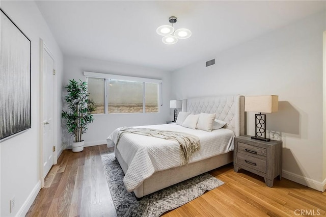 4820 Encino Ter, Encino, CA 91316 - bedroom featuring light wood finished floors and baseboards