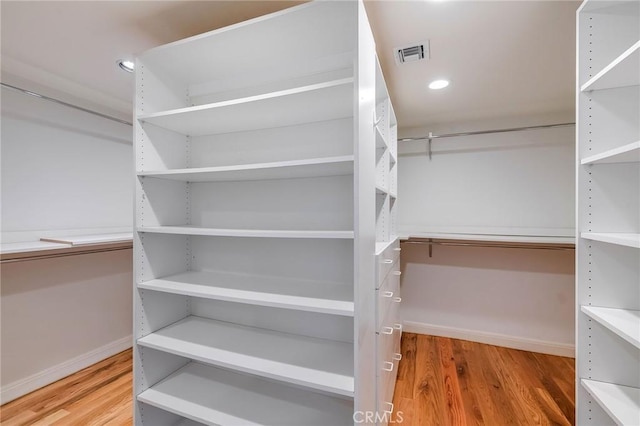 4820 Encino Ter, Encino, CA 91316 - spacious closet featuring wood finished floors