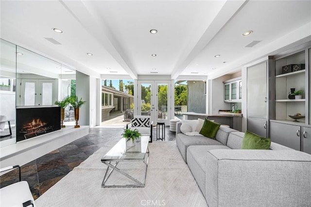 4820 Encino Ter, Encino, CA 91316 - living room featuring french doors, recessed lighting, and stone finish floors