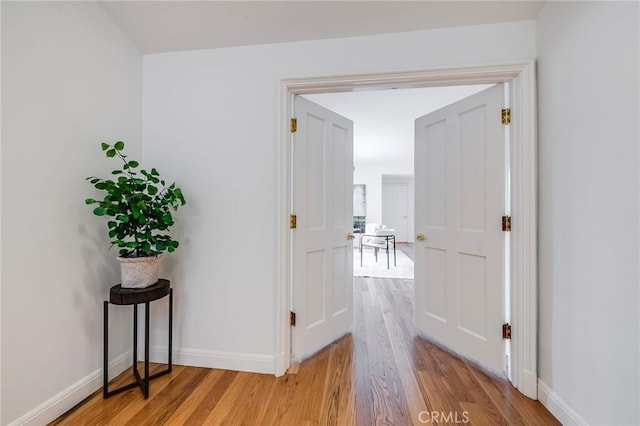 4820 Encino Ter, Encino, CA 91316 - hall featuring light wood finished floors and baseboards
