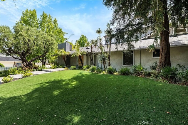 4820 Encino Ter, Encino, CA 91316 - view of front of house with stucco siding and a front lawn