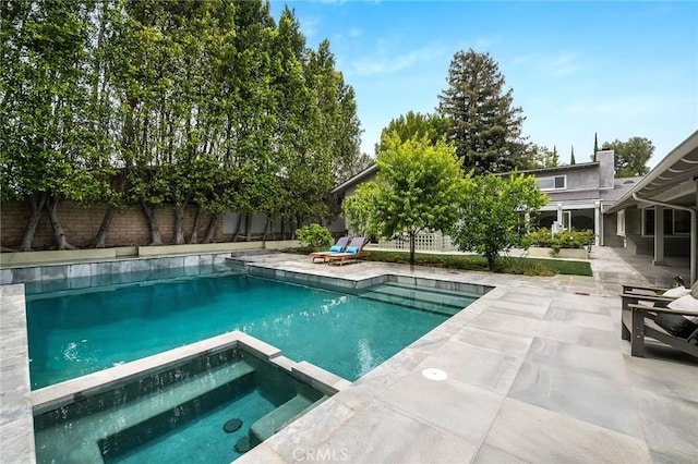 4820 Encino Ter, Encino, CA 91316 - view of swimming pool with a patio area, a pool with connected hot tub, and a fenced backyard