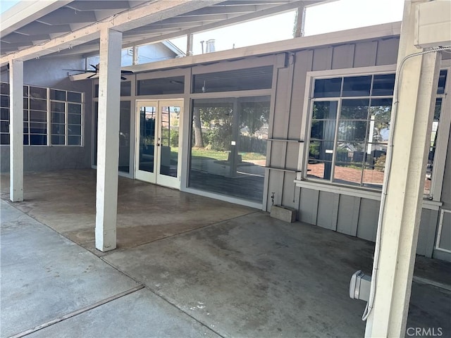149 Acacia Ave, Oroville, CA 95966 - doorway to property featuring french doors, a patio area, and board and batten siding