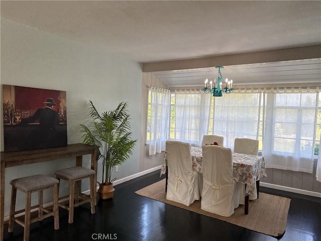 149 Acacia Ave, Oroville, CA 95966 - dining area featuring baseboards, wood finished floors, and plenty of natural light