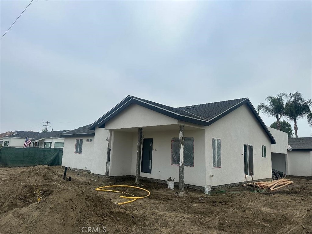 9555 Reichling Ln, Pico Rivera, CA 90660 - view of front of property featuring stucco siding