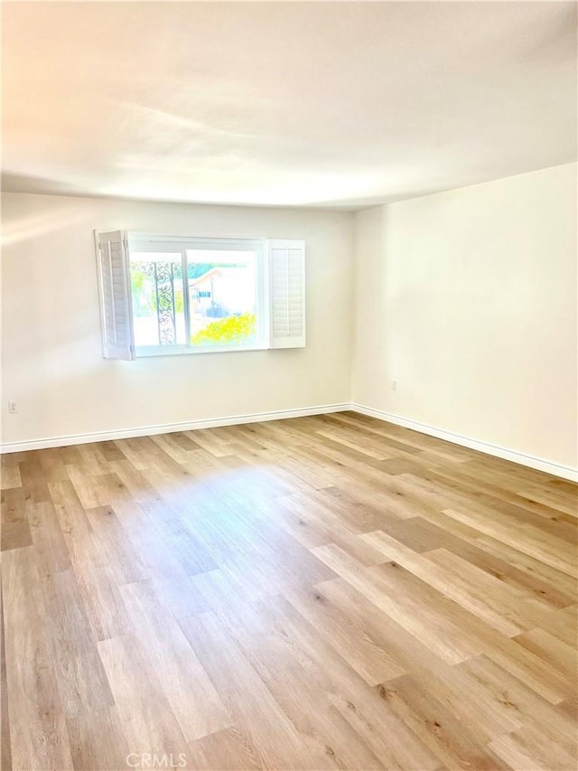 29041 Desert Hills Rd, Menifee, CA 92586 - unfurnished room with wood finished floors and baseboards