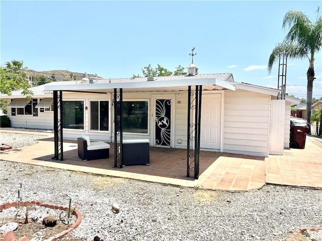 29041 Desert Hills Rd, Menifee, CA 92586 - back of house with a patio