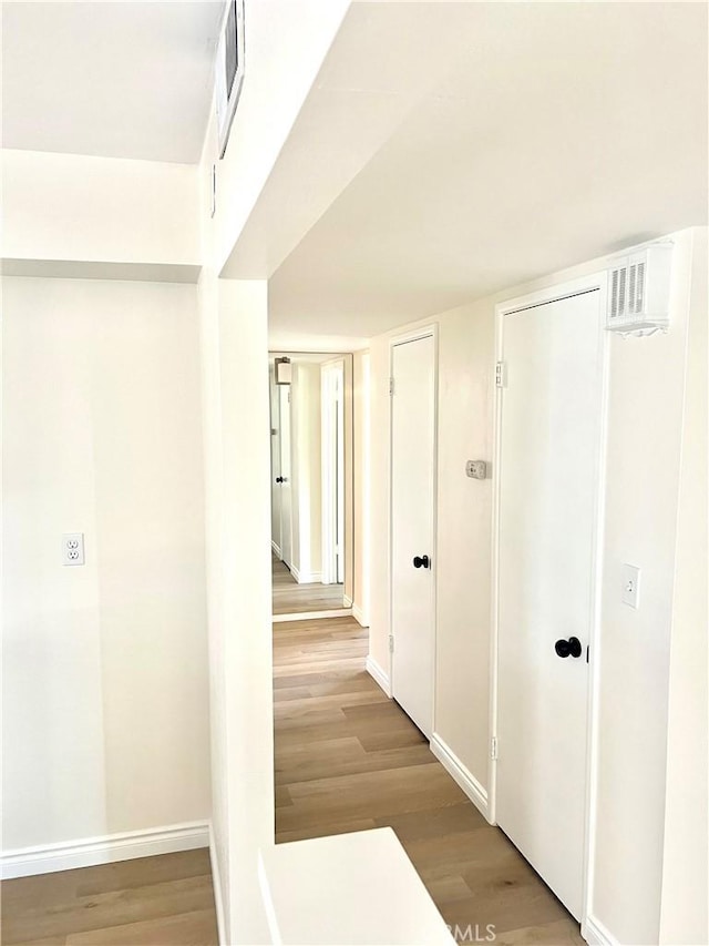 29041 Desert Hills Rd, Menifee, CA 92586 - hall with wood finished floors and baseboards