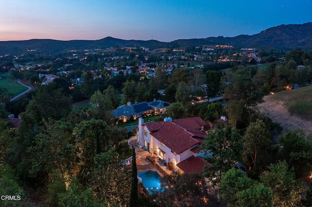 4548 Valley Spring Dr, Westlake Village, CA 91362 - view of property location with a mountainous background and a pool area